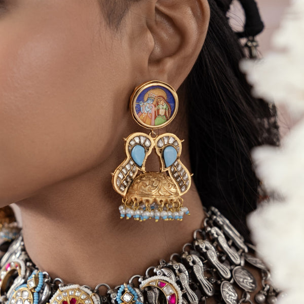 MDE908- White and Firoza Colour Thappa Jhumki Earrings with Radha and Krishna Touch