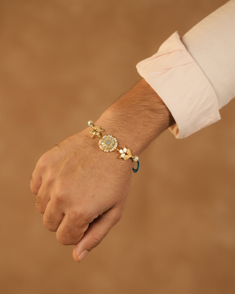 MDRB1278 - White Colour Gold Plated Mother of Pearl Thread Rakhi