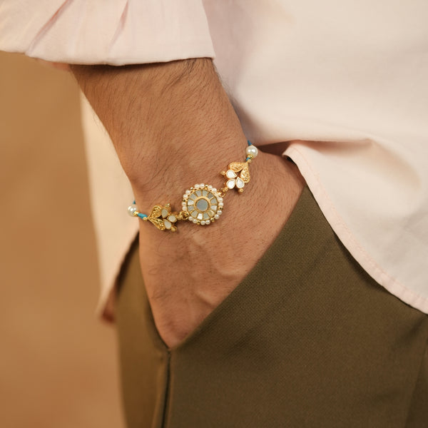 MDRB1278 - White Colour Gold Plated Mother of Pearl Thread Rakhi