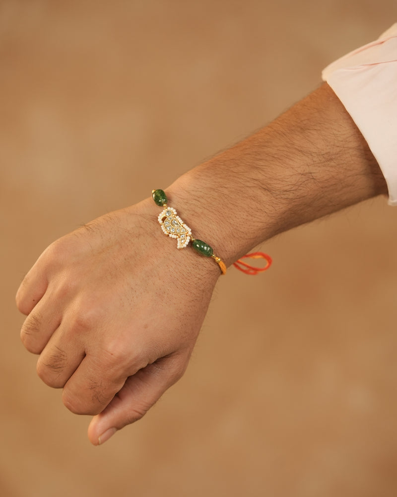 MDRB1279 - White and Green Colour Gold Plated Jadau Kundan Peacock Rakhi