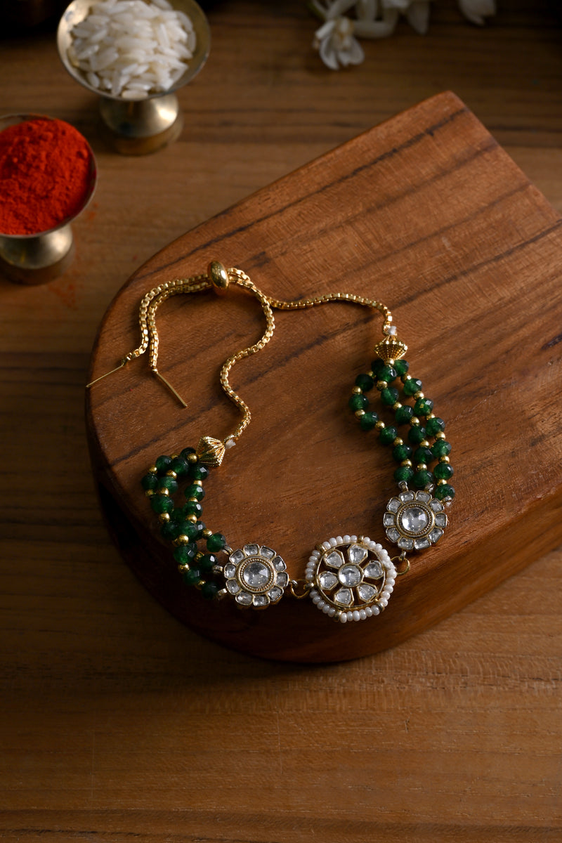 White and Green Colour Gold Plated Jadau Kundan Rakhi