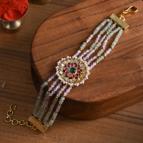 MDB834- Multi Colour Gold Plated Mother of Pearl Rakhi