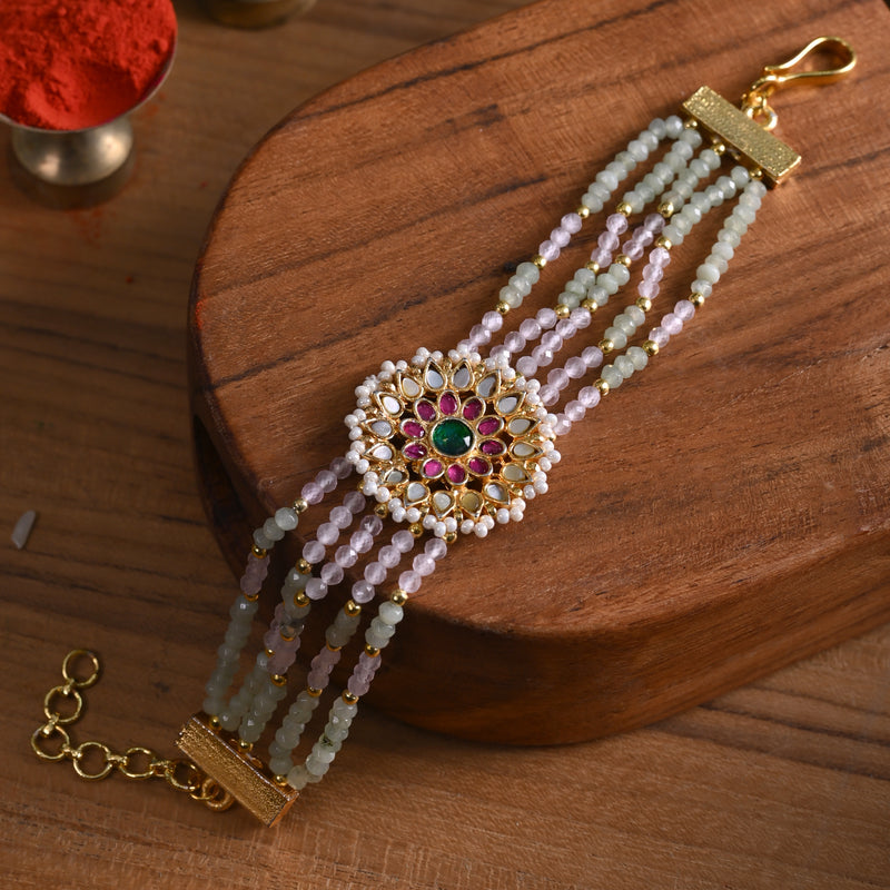 MDB834- Multi Colour Gold Plated Mother of Pearl Rakhi