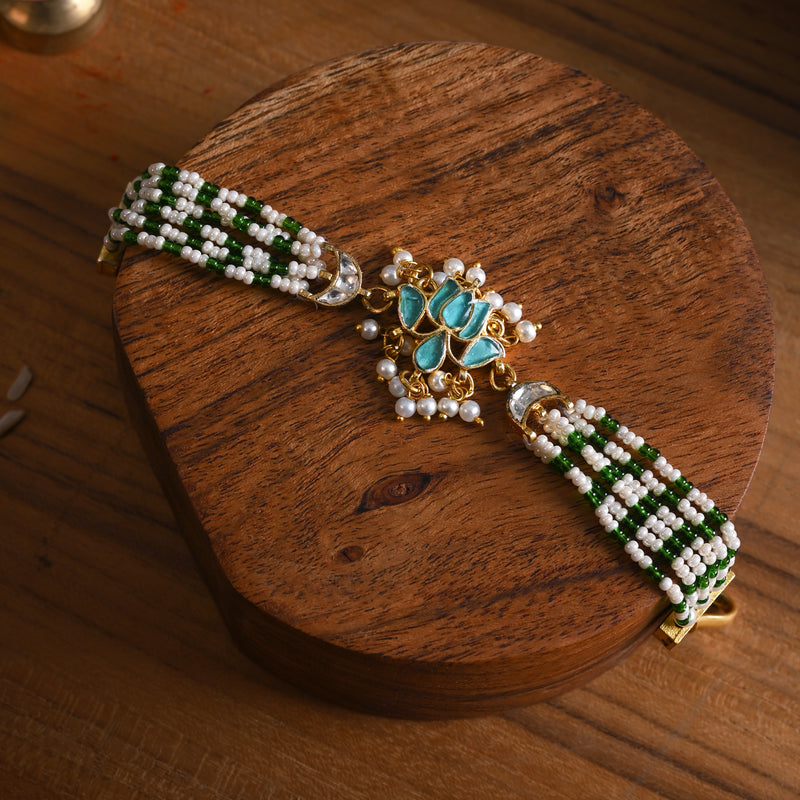 MDB839- Blue and White Colour Gold Plated Jadau Kundan Lotus Motif Rakhi