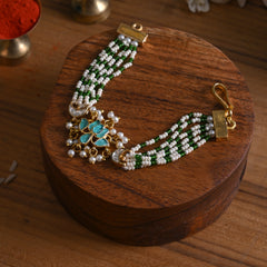 MDB839- Blue and White Colour Gold Plated Jadau Kundan Lotus Motif Rakhi