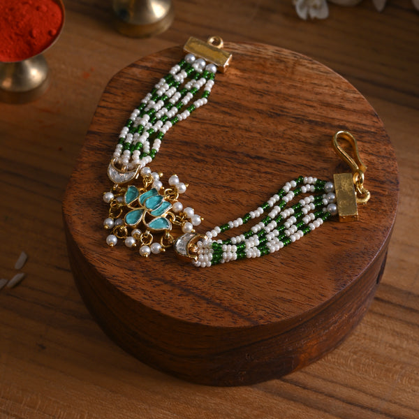 MDB839- Blue and White Colour Gold Plated Jadau Kundan Lotus Motif Rakhi
