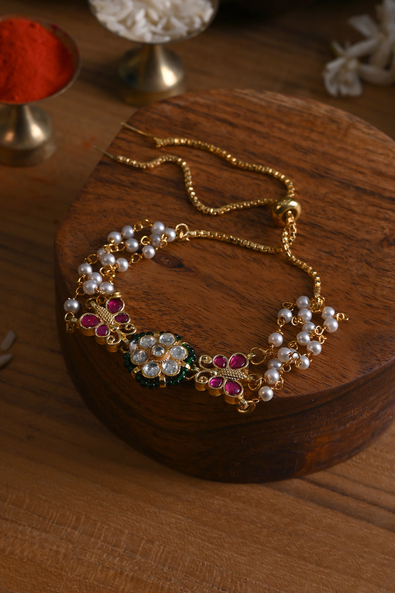 White and Pink Colour Gold Plated Jadau Kundan Flower and Butterfly Motif Rakhi