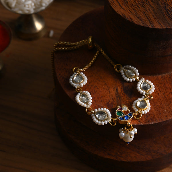 MDB841- Multi Colour Gold Plated Jadau Kundan Peacock Motif Rakhi