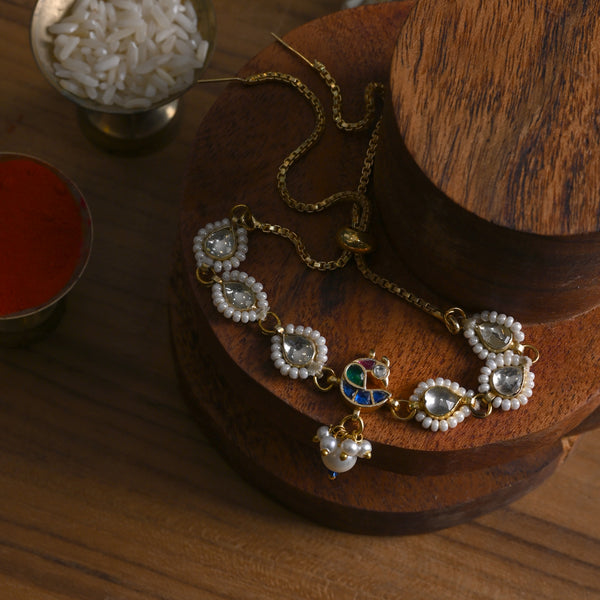 MDB841- Multi Colour Gold Plated Jadau Kundan Peacock Motif Rakhi