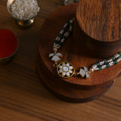 MDB842- White and Green Colour Gold Plated Mother of Pearl Rakhi
