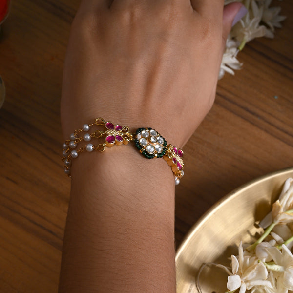 MDB840- White and Pink Colour Gold Plated Jadau Kundan Flower and Butterfly Motif Rakhi