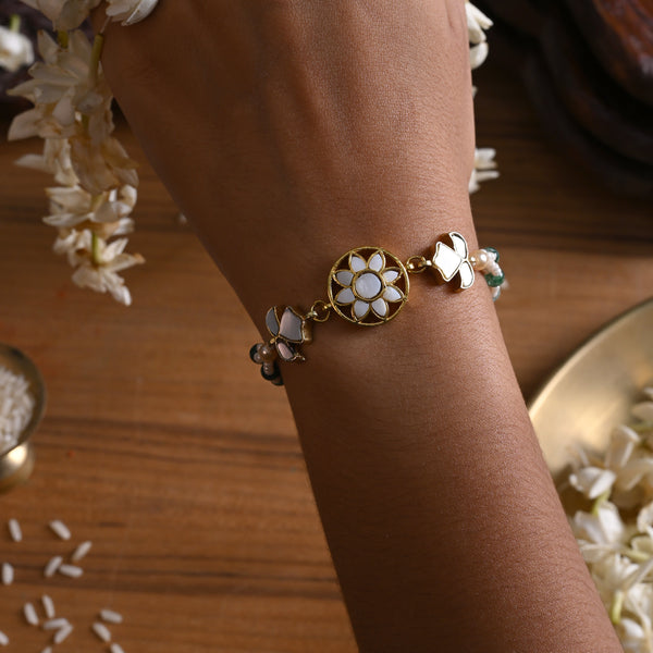 MDB842- White and Green Colour Gold Plated Mother of Pearl Rakhi