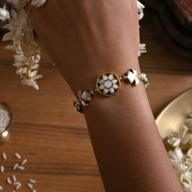 MDB842- White and Green Colour Gold Plated Mother of Pearl Rakhi