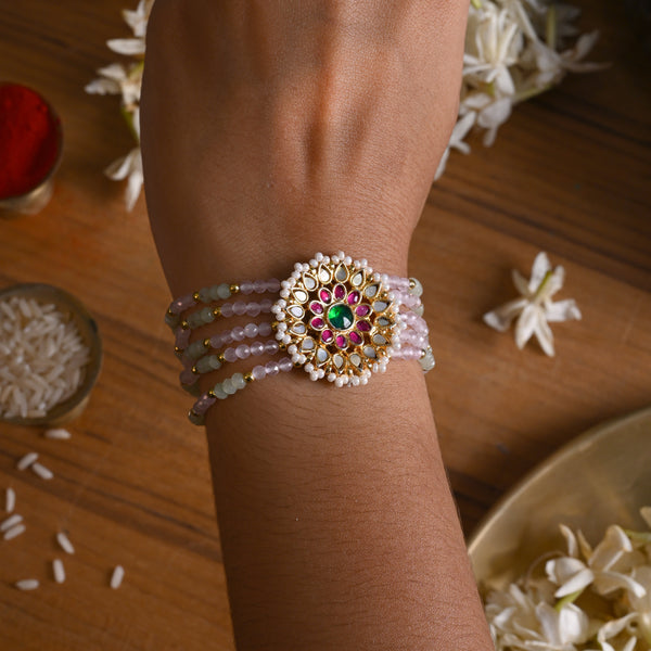 MDB834- Multi Colour Gold Plated Mother of Pearl Rakhi