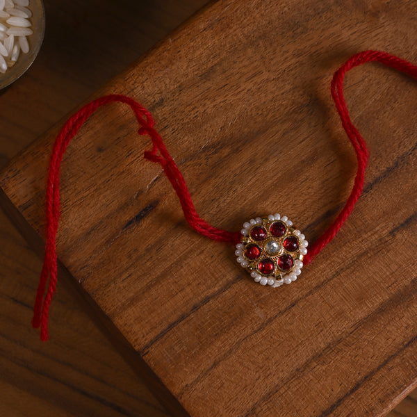 MDB845- Red and White Colour Gold Plated Jadau Kundan Flower Motif Rakhi