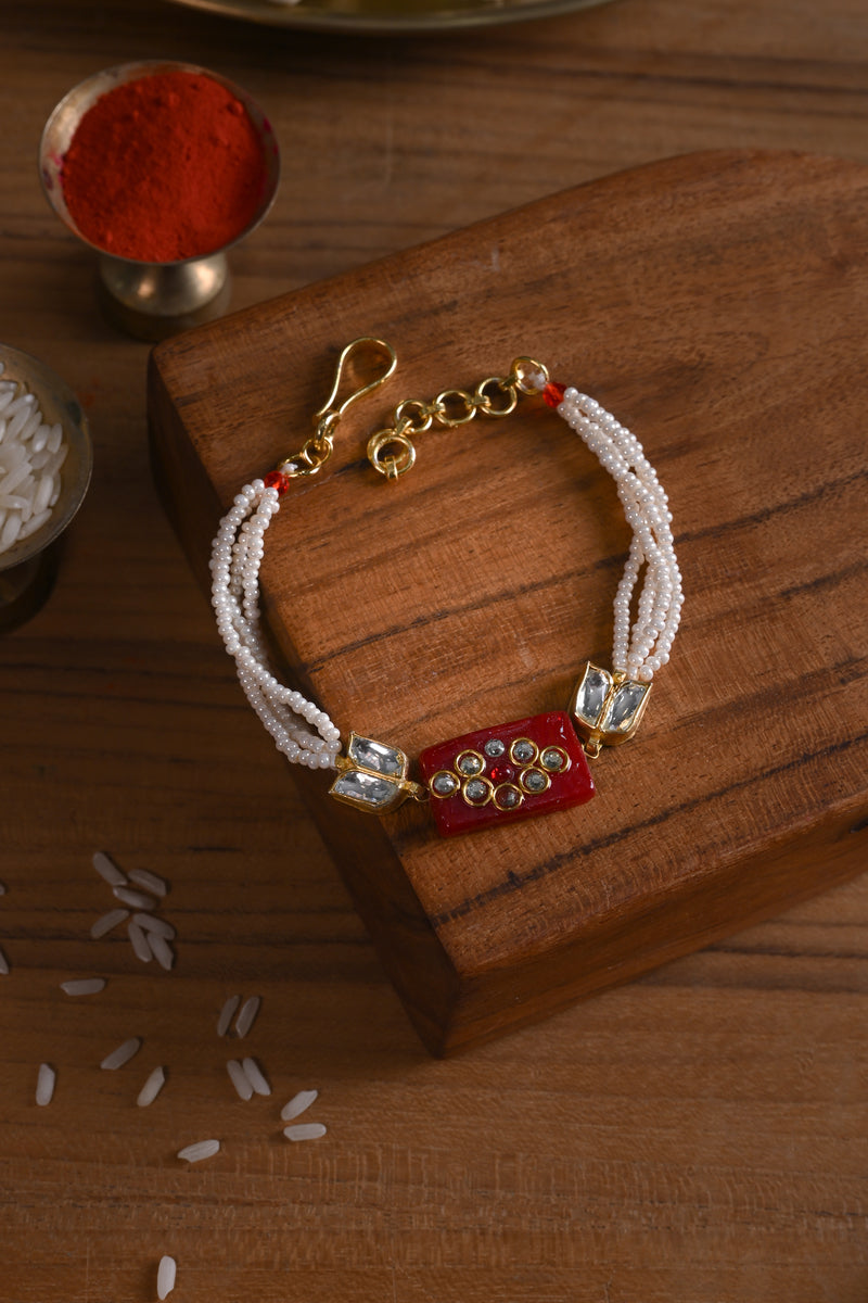 Red and White Colour Gold Plated Jadau Kundan Rakhi