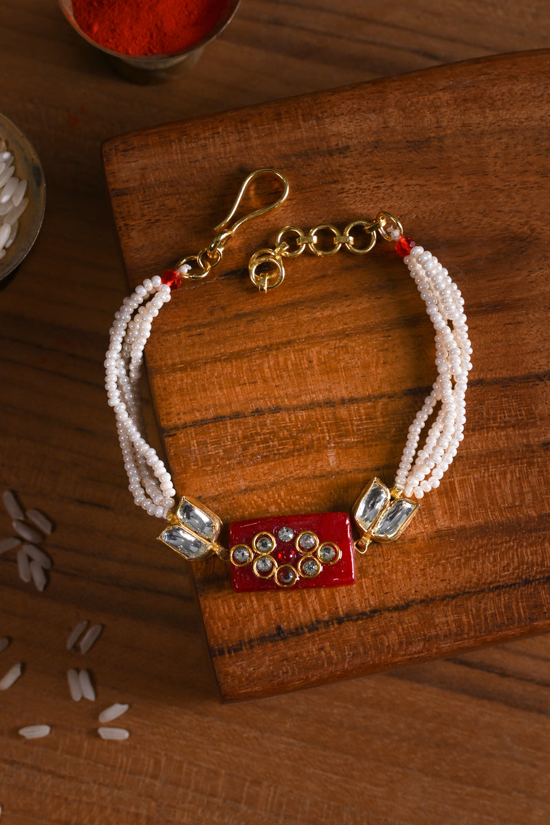 Red and White Colour Gold Plated Jadau Kundan Rakhi
