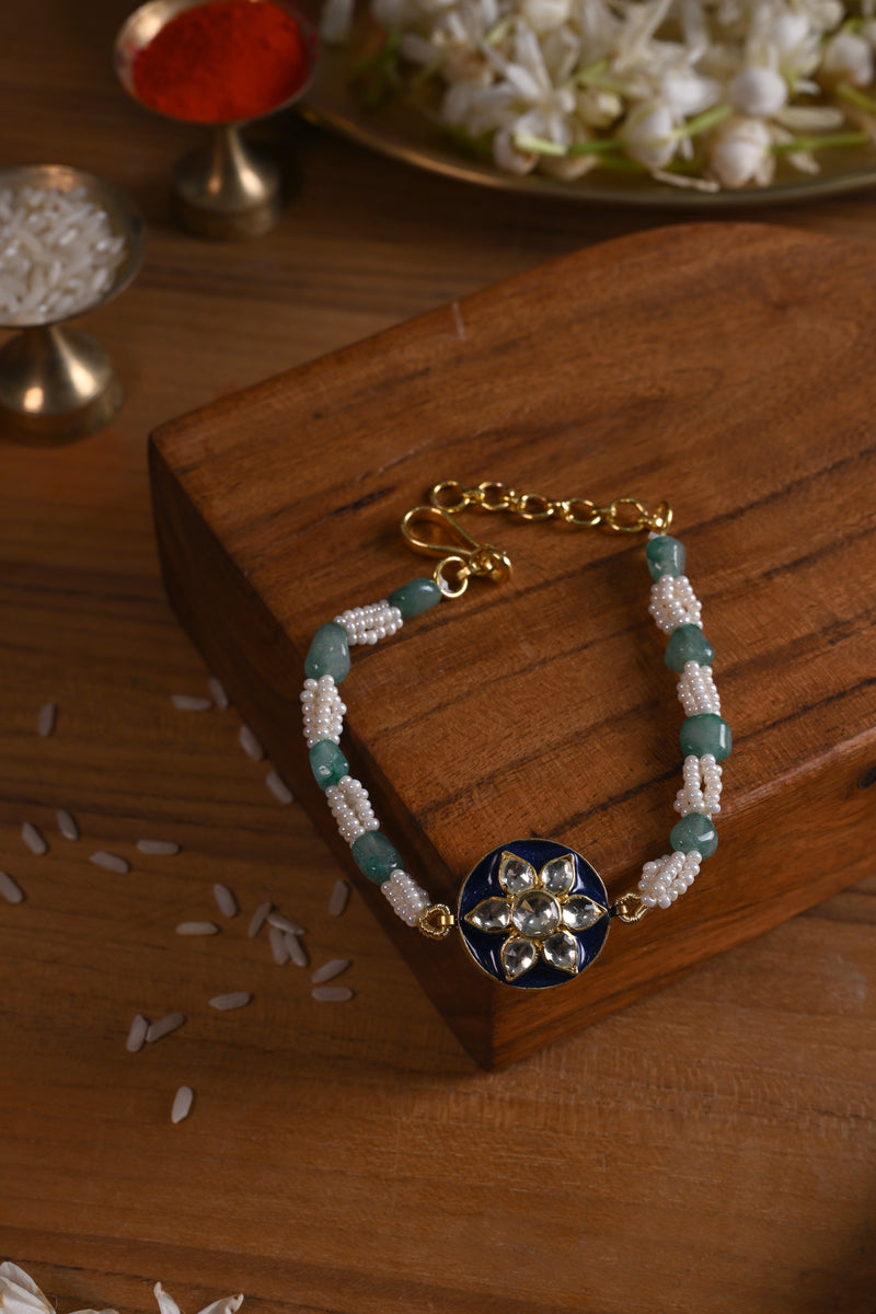 Blue and White Colour Gold Plated Jadau Kundan Rakhi